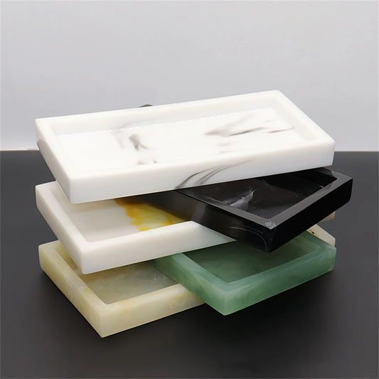 A sleek, rectangular marble texture resin tray for stylish home and kitchen storage and decor.